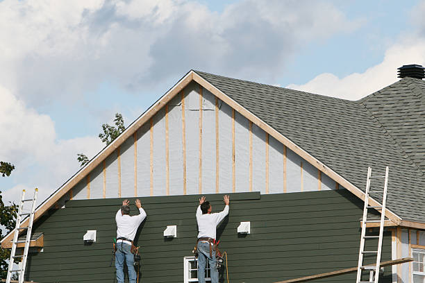Professional Siding Installation technician working in Cape Coral, FL